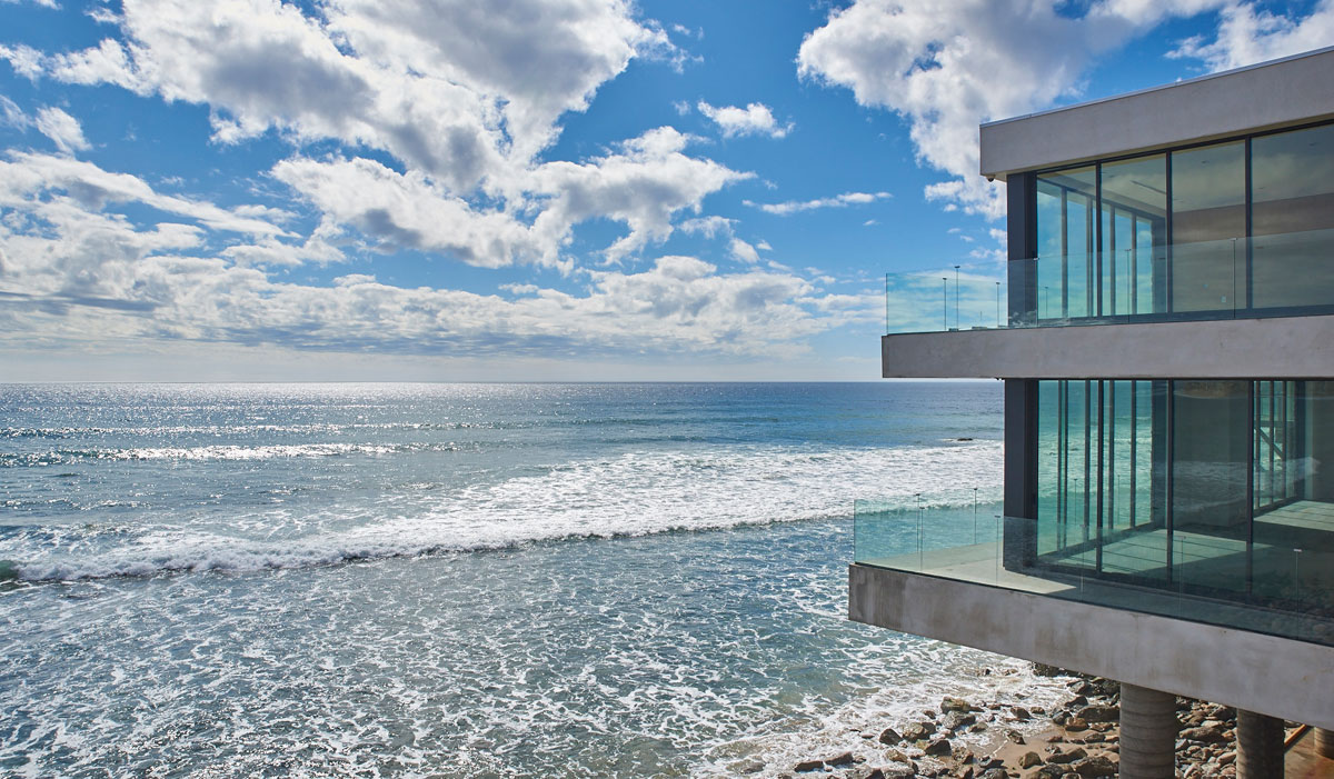 New houses are being built literally in the waves at Malibu